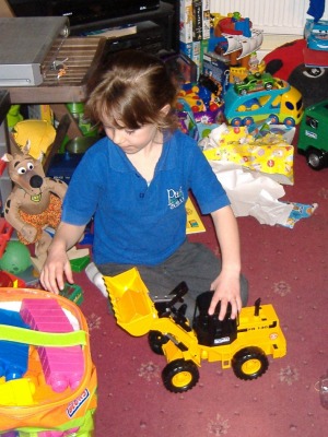 Playing with one of Charlie's birthday presents.